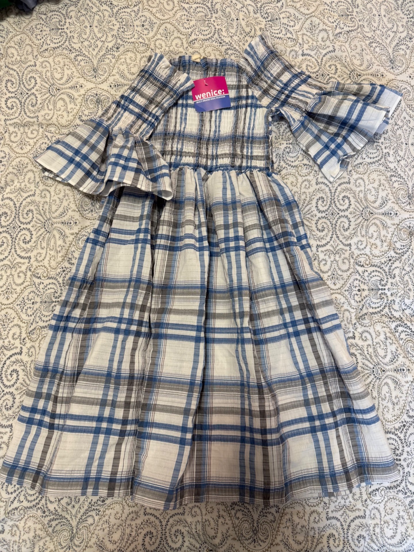 Wenice Nov fustan so etiketa